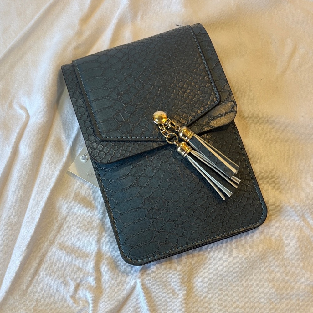 Chic Black Textured Crossbody Bag with Tassel